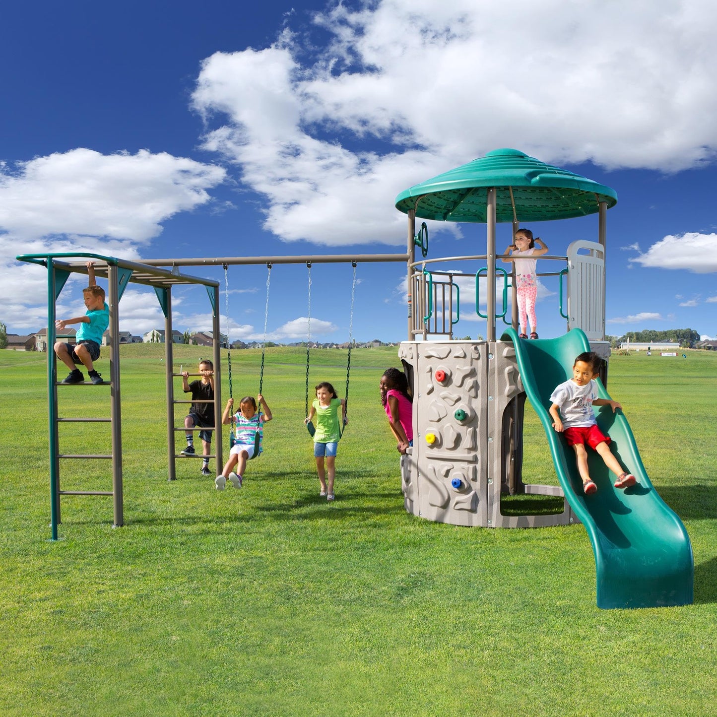 Lifetime Adventure Tower Deluxe Swing Set Playset Lifetime Adventure Tower, Covered Clubhouse, 9 ft Wavy Slide, Monkey Bars, Climbing Wall, Fireman’s Pole, Belt Swings & Trapeze
